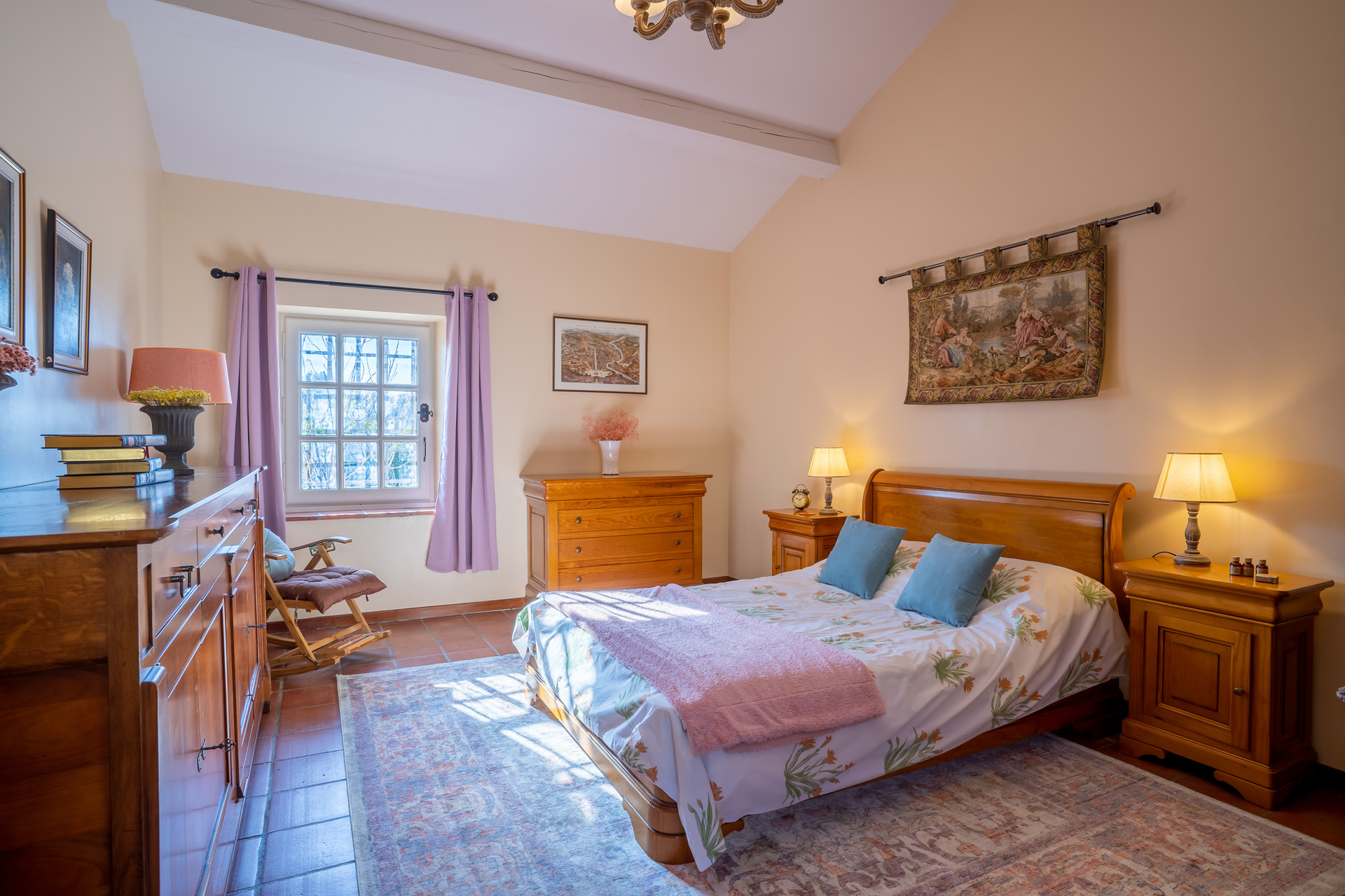 Manor bedroom with tapestry
